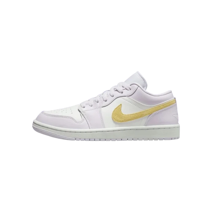 White sneaker with a gold Nike logo on a white background